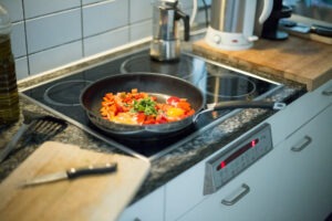 Sauteeing vegetables on a stove