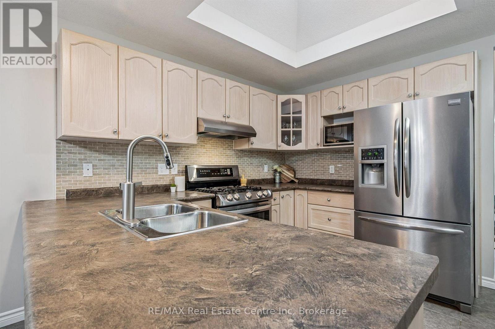 21 Wideman Boulevard, Guelph, Ontario  N1E 0J2 - Photo 4 - X12803530