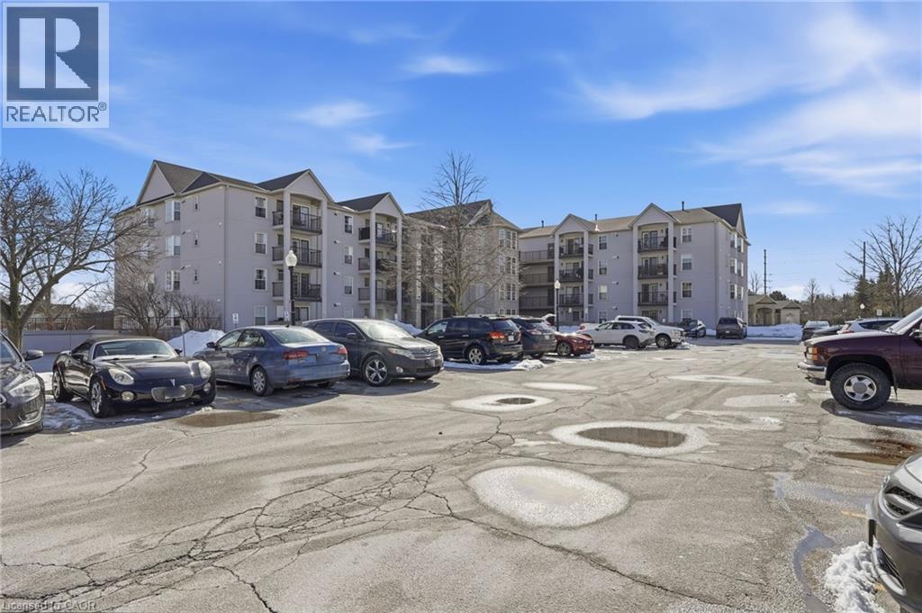 1411 Walkers Line Unit# 213, Burlington, Ontario  L7M 4P5 - Photo 2 - 40806760