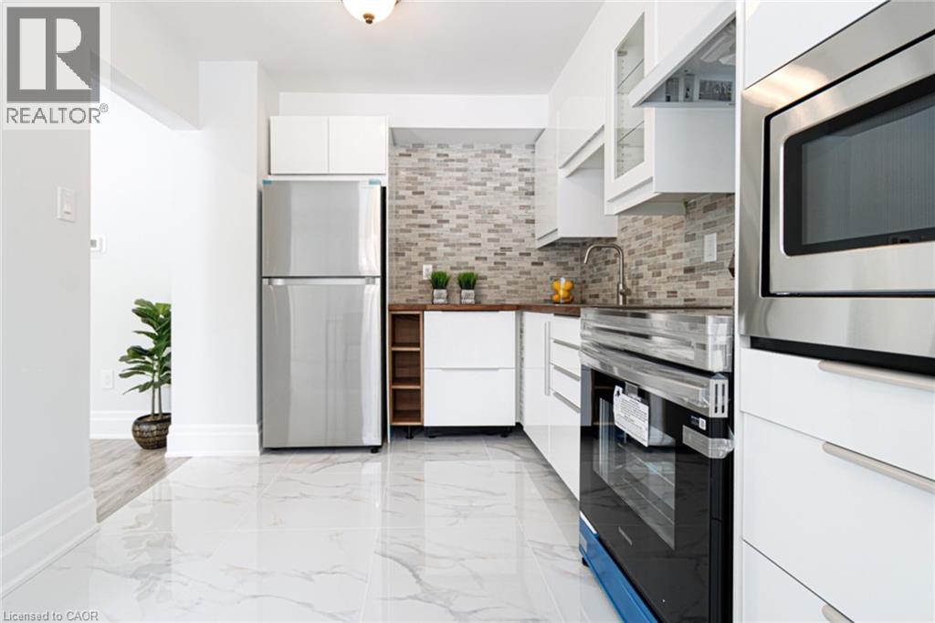 1532 Lancaster Drive Unit# 41, Oakville, Ontario  L6H 2Z3 - Photo 14 - 40829376