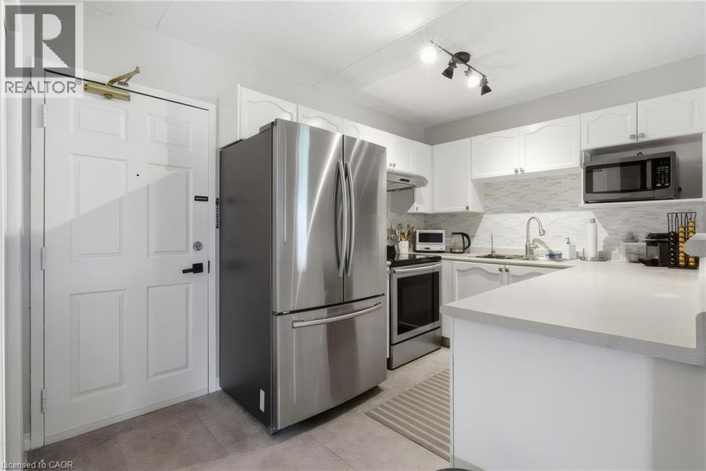 1421 Walkers Line Unit# 209, Burlington, Ontario  L7M 4P4 - Photo 12 - 40833749