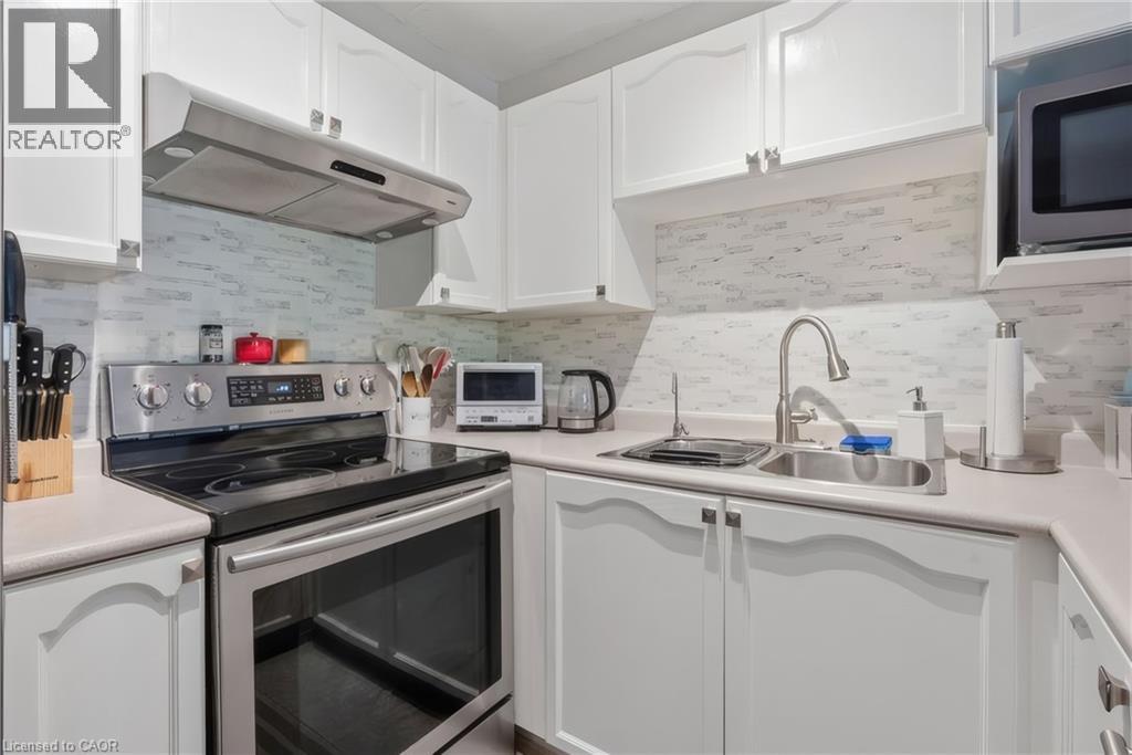 1421 Walkers Line Unit# 209, Burlington, Ontario  L7M 4P4 - Photo 8 - 40833749