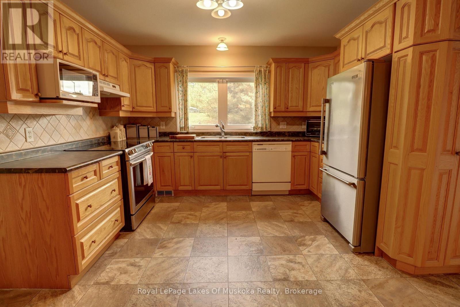 106 - 31 Dairy Lane, Huntsville, Ontario  P1H 2L7 - Photo 4 - X13419994