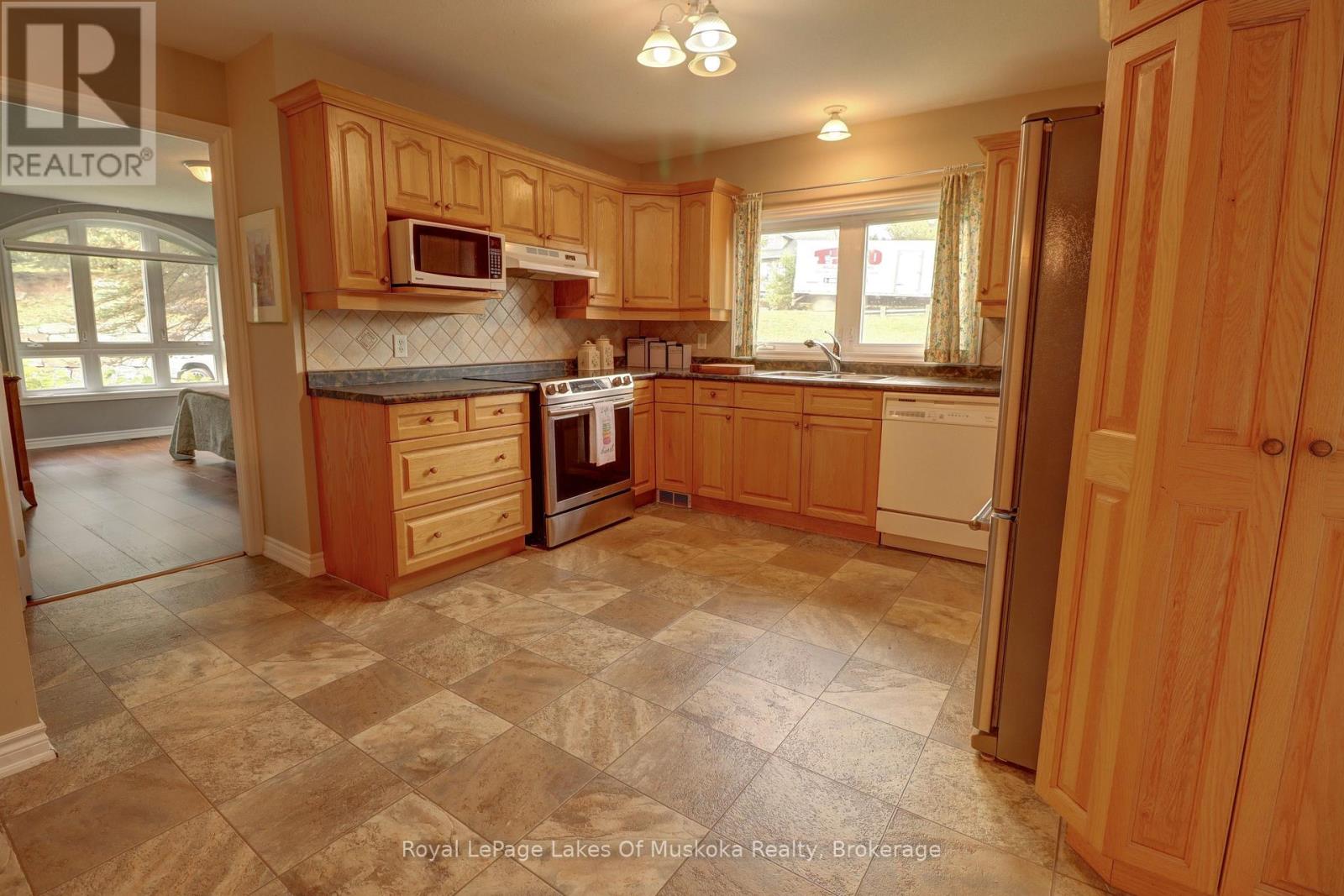 106 - 31 Dairy Lane, Huntsville, Ontario  P1H 2L7 - Photo 5 - X13419994