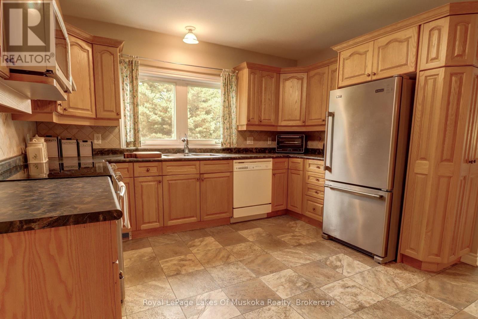 106 - 31 Dairy Lane, Huntsville, Ontario  P1H 2L7 - Photo 6 - X13419994